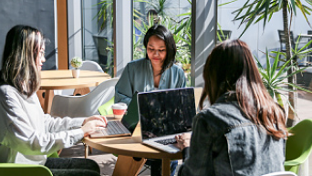 Team members reviewing report